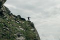 Silhouette of a champion on mountain peak. Active life concept Royalty Free Stock Photo