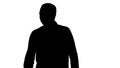 Silhouette Charming successful young entrepreneur in walking and