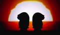 Silhouette Chess pieces knights isolated on sunrise background. Confrontation of chess pieces knights head with space for copy