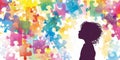 Silhouette of a child against a vibrant puzzle background, symbolizing the complexities of child psychology and Royalty Free Stock Photo