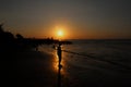 Silhouette on the beach at sunset Royalty Free Stock Photo