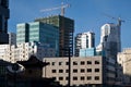 Silhouette of Choijin Lama Temple against construction of new buildings in Ulaanbaatar, Mongolia