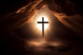 Silhouette of a Christian cross in a cave. Cross of Jesus Christ at the end of the tunnel. Royalty Free Stock Photo