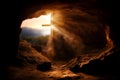 Silhouette of Christian cross in cave. Cross of Jesus Christ at the end of the tunnel. Royalty Free Stock Photo