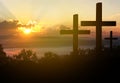 Silhouette christian cross on grass in sunrise background Royalty Free Stock Photo