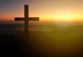 Silhouette christian cross on grass in sunrise background Royalty Free Stock Photo