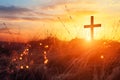 silhouette christian cross on grass in sunrise Royalty Free Stock Photo