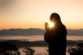 Silhouette of christian man hand praying,spirituality and religion,man praying to god. Royalty Free Stock Photo