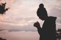 Silhouette of christian man hands praying to god, Man Pray for g Royalty Free Stock Photo