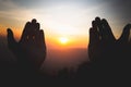 Silhouette of christian man hands praying to god, Man Pray for god blessing to wishing have a better life. begging for forgiveness Royalty Free Stock Photo