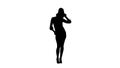 Silhouette Christmas girl in santa hat dancing happy laughing having fun Royalty Free Stock Photo