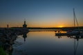 The silhouette of a church, a fisherman and a boat Royalty Free Stock Photo