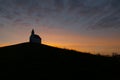 Silhouette of a church on a hill, de Terp, at sunrise, the Hague, Netherlands Royalty Free Stock Photo