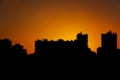 Silhouette city and building skyline in front of sunset Royalty Free Stock Photo