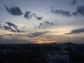 Silhouette of city with sunset on evening