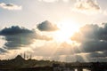 Silhouette of the cityscape of Istanbul with sun rays through the clouds Royalty Free Stock Photo