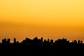 Silhouette of cityscaper buildings during a sunset Royalty Free Stock Photo