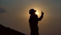 Silhouette Civil engineer inspection building and calling on site