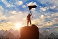 Silhouette of a climber on a mountain top Royalty Free Stock Photo