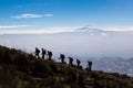 Silhouette of climbers against the light