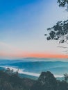 Silhouette cloud forest and peak mountains