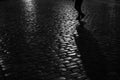 Silhouette on Cobblestone Path in Warsaw, Poland at Night Royalty Free Stock Photo