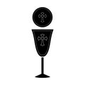 Silhouette of a communion cup and host Royalty Free Stock Photo