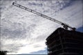 Silhouette of the construction crane in the construction site with blue sky Royalty Free Stock Photo
