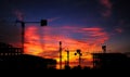 Silhouette Construction Site and Abandon building with sunset ba