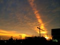 The Silhouette of construction site under sunset. Royalty Free Stock Photo