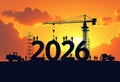 Silhouette of construction workers assembling the year 2026 at sunset. A crane Royalty Free Stock Photo