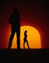 Silhouette Couple Against Sunset Royalty Free Stock Photo