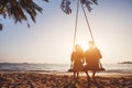 Silhouette of couple on the beach, romantic vacation Royalty Free Stock Photo