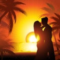 Silhouette of couple on beach at sunset Royalty Free Stock Photo