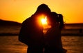 Silhouette couple, beach sunset and love outdoors on summer vacation, honeymoon travel and tropical holiday in Maldives Royalty Free Stock Photo