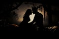 Silhouette of couple in bed at night time relationship. Generate Ai