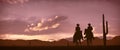 Silhouette of a couple of Cowboys Royalty Free Stock Photo