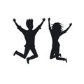 Silhouette of couple man and woman jumping for joy Royalty Free Stock Photo