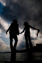 Silhouette of couple holding hands Royalty Free Stock Photo