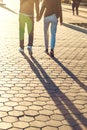 Silhouette of a couple with holding hands, a walk at sunset, an Royalty Free Stock Photo