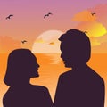 Silhouette of a couple kissing against a sunset sky Royalty Free Stock Photo