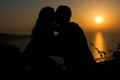 Silhouette of a couple kissing at Sunset Royalty Free Stock Photo