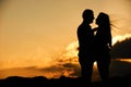 Silhouette of couple kissing at sunset Royalty Free Stock Photo