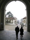 silhouette of a couple leaving church