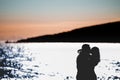 Silhouette of a couple in love on the beach at sunset.Love story.Man and a woman on the beach Royalty Free Stock Photo