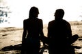 Silhouette of a couple in love on the beach at sunset.Love story.Man and a woman on the beach Royalty Free Stock Photo