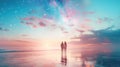 Silhouette of a couple in love on the beach at sunset, staring at the the dreamy sky. Romantic evening. Royalty Free Stock Photo