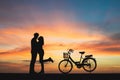 Silhouette of couple in love kissing in sunset. Couple in love c Royalty Free Stock Photo