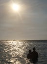 Silhouette of couple of lovers on Cape beach beach Royalty Free Stock Photo