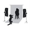 Silhouette of couple making photoshoot in photo studio